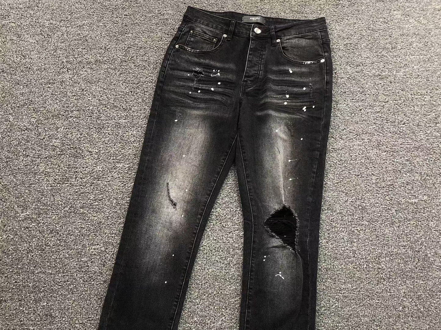 Calça AMIRI Black Paint Wash Denim