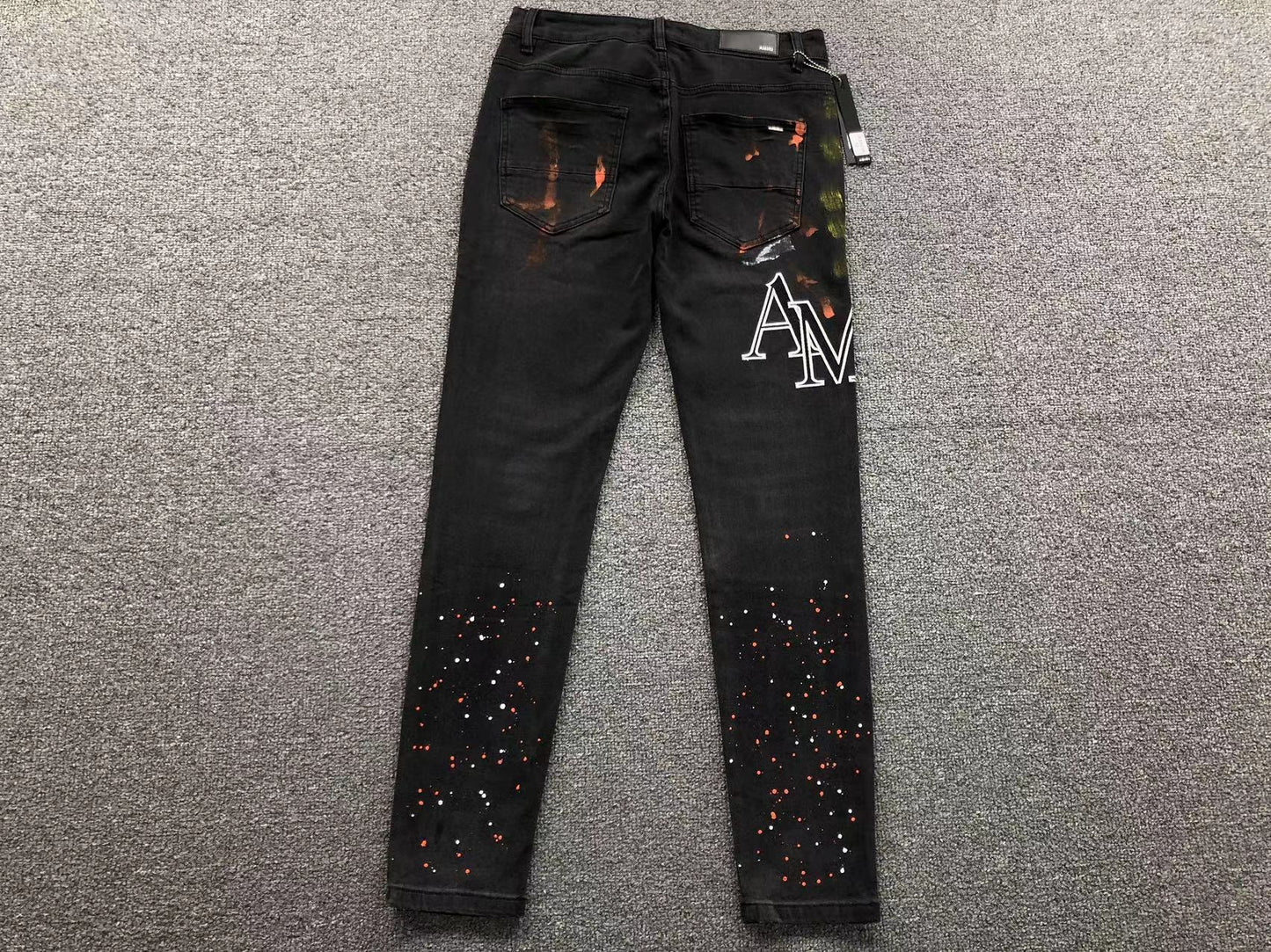 Calça AMIRI Logo Paint Splatter Black Denim