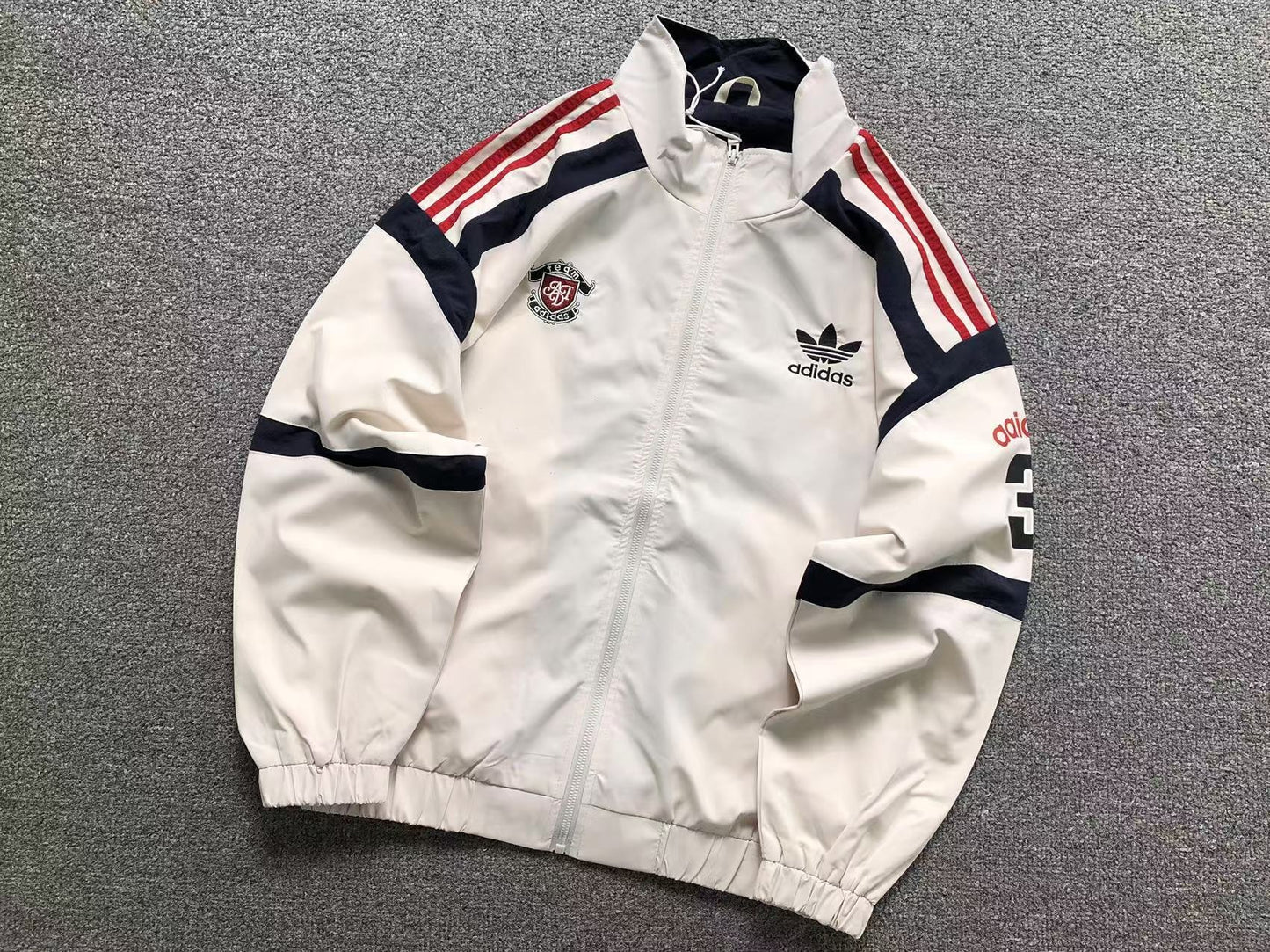 Jaqueta Adidas Racing Division Windbreaker