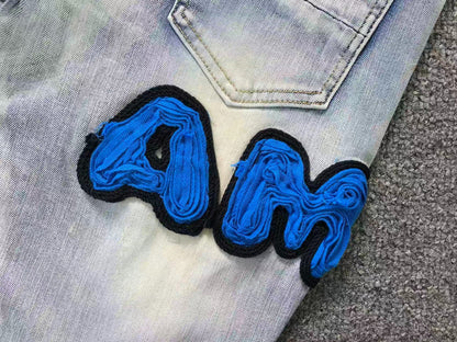 Calça AMIRI Ice Blue Patch Denim