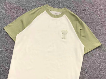 Camiseta AMI Paris Raglan Logo Coração