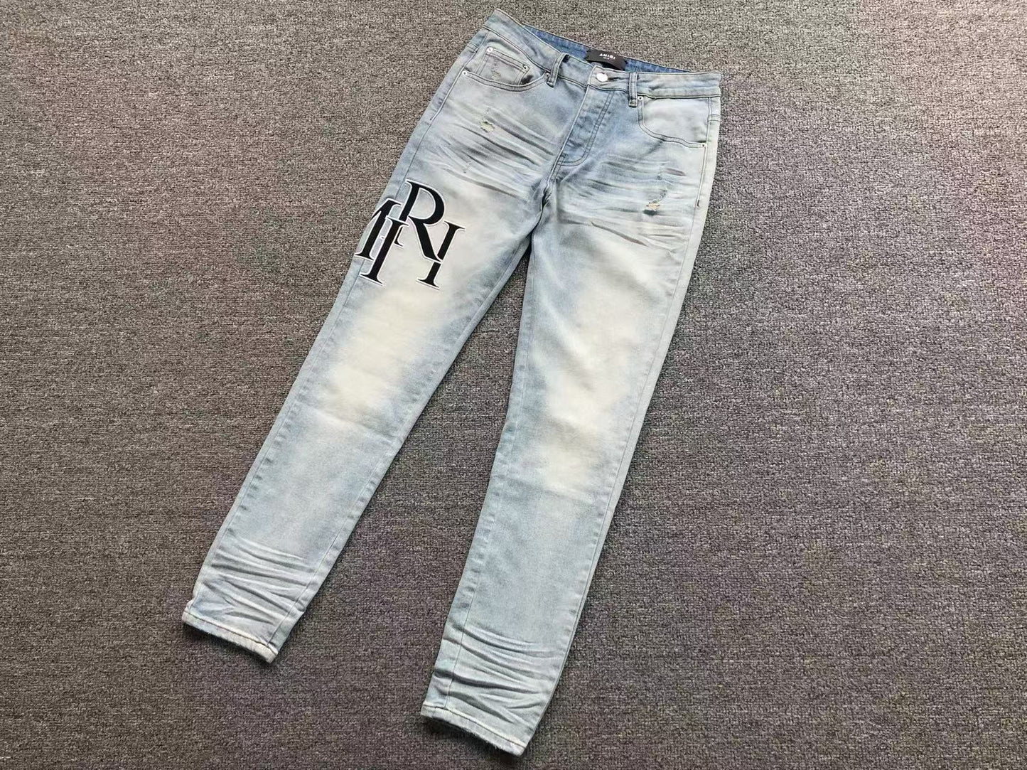 Calça AMIRI TR Monogram Ice Blue Denim