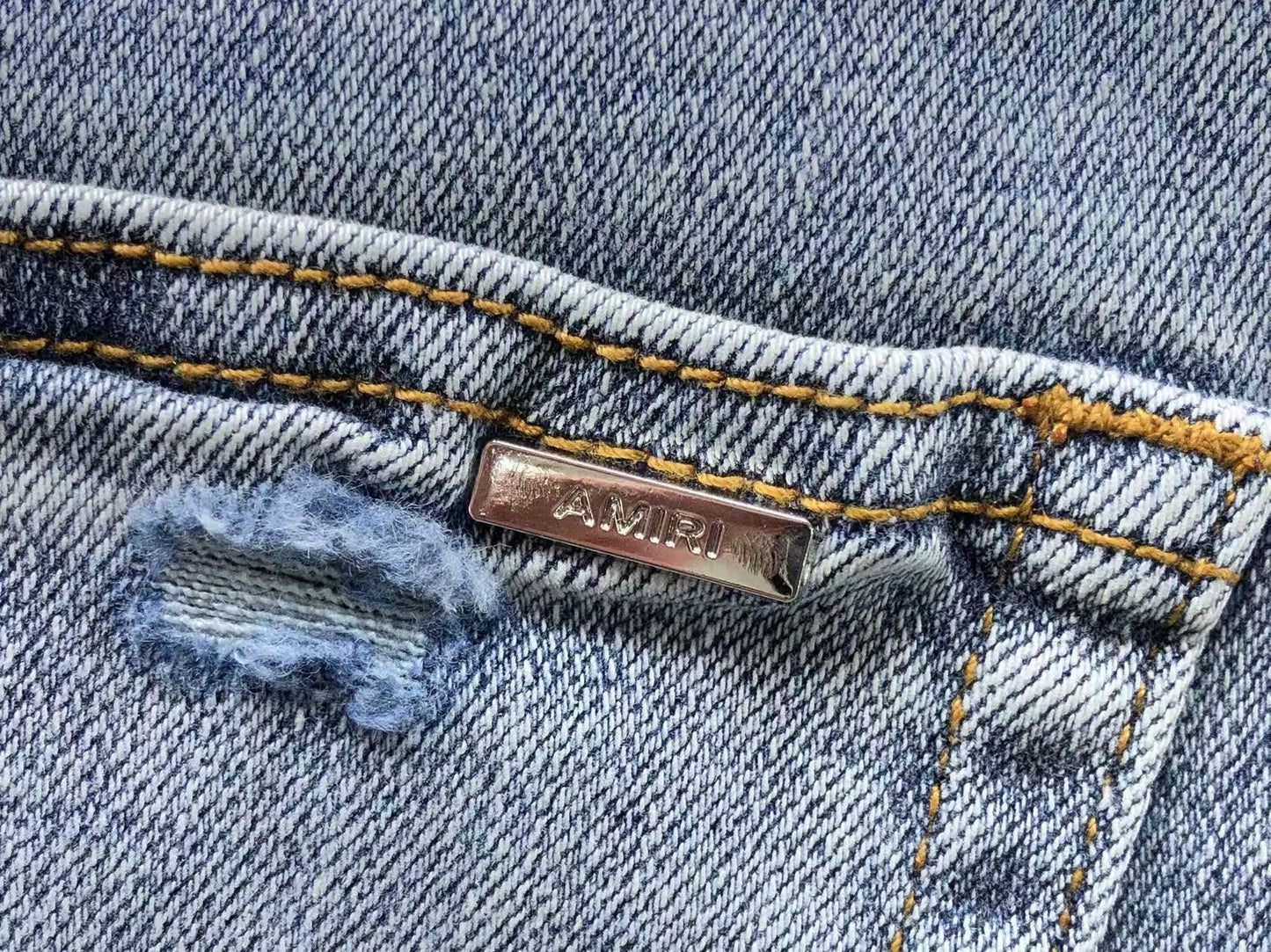 Calça AMIRI Ice Destroyed Paint Denim