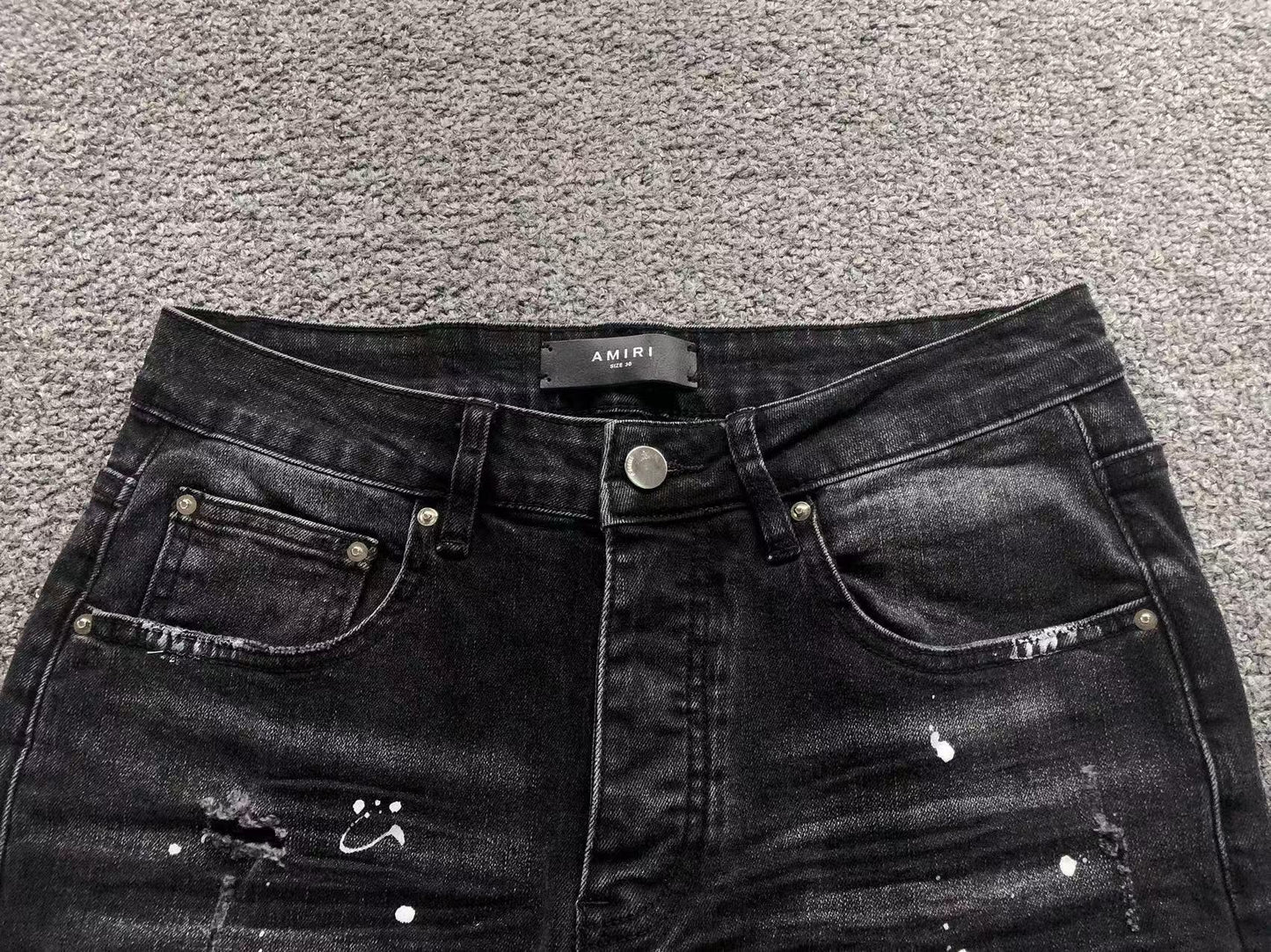 Calça AMIRI Black Paint Wash Denim