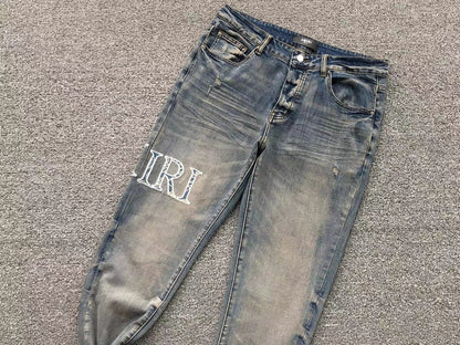 Calça AMIRI Vintage Logo Washed Denim