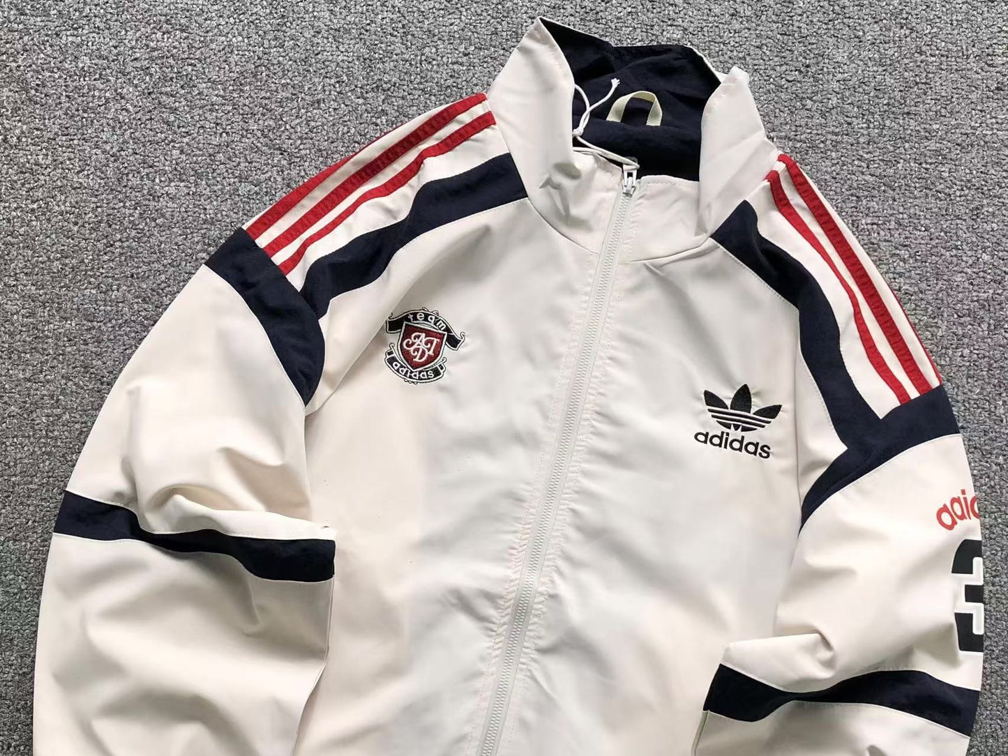 Jaqueta Adidas Racing Division Windbreaker
