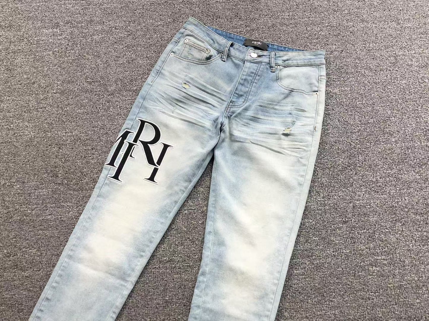 Calça AMIRI TR Monogram Ice Blue Denim