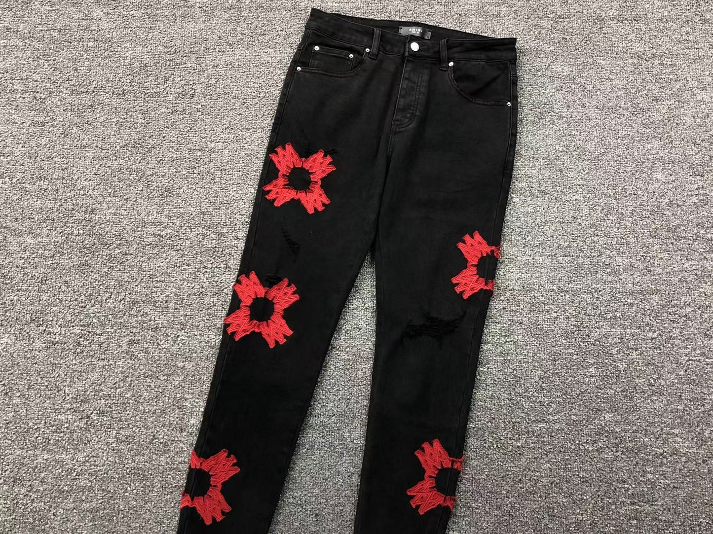Calça AMIRI Bullet Hole Patch Black Denim