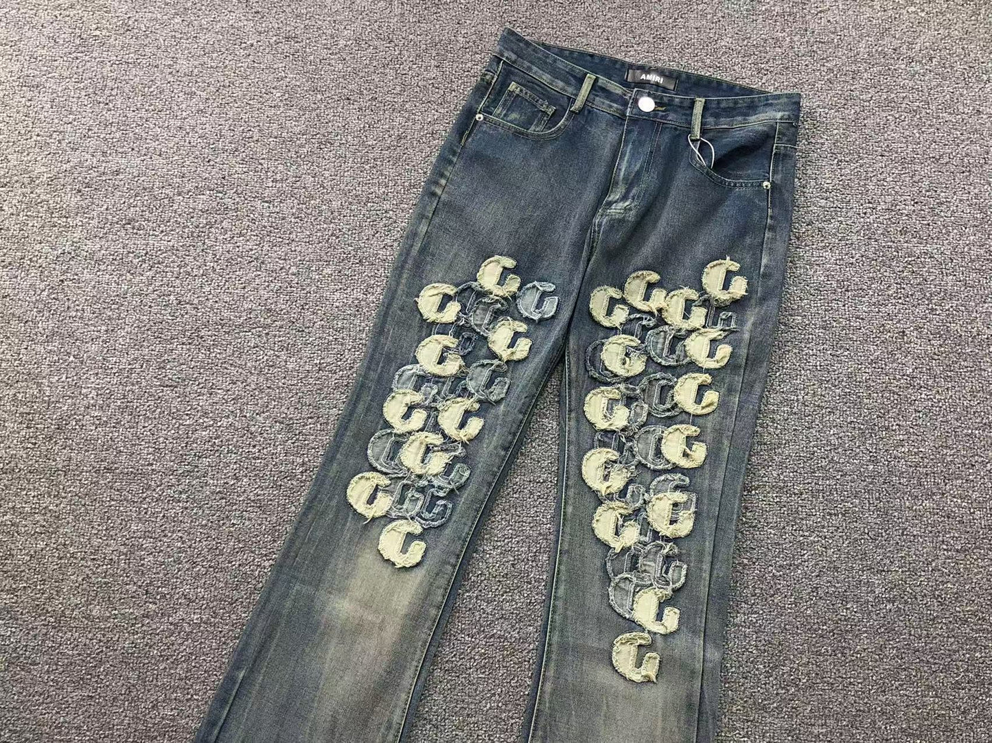 Calça AMIRI Gothic Patch Flared Trousers