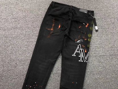 Calça AMIRI Logo Paint Splatter Black Denim