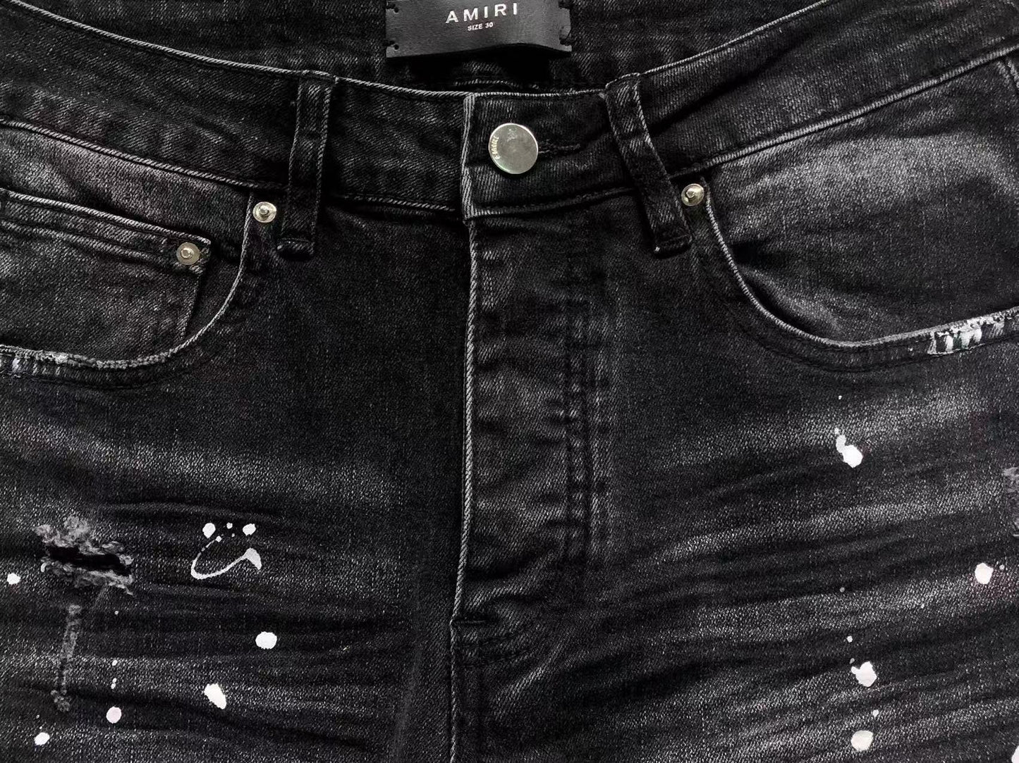 Calça AMIRI Black Paint Wash Denim