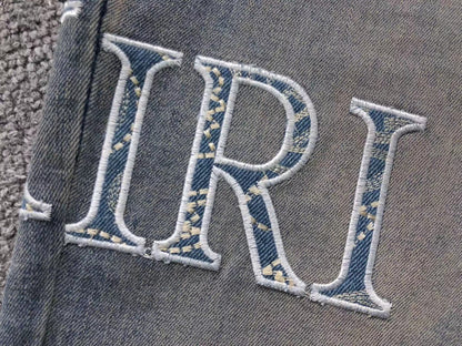 Calça AMIRI Vintage Logo Washed Denim