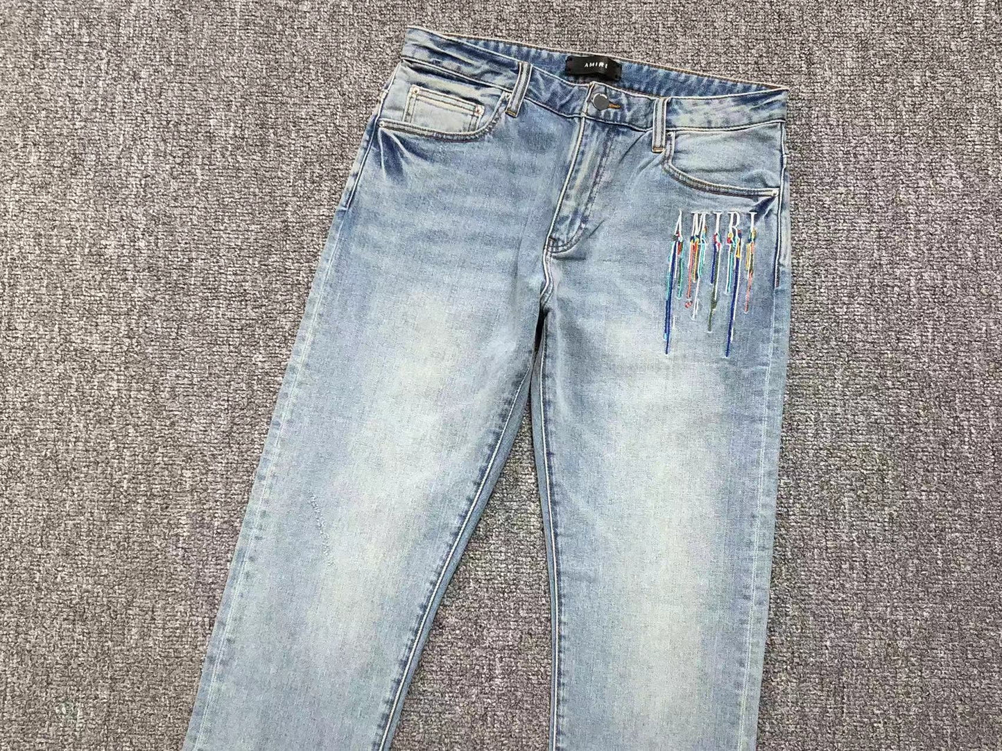 Calça AMIRI Paint Drip Light Wash
