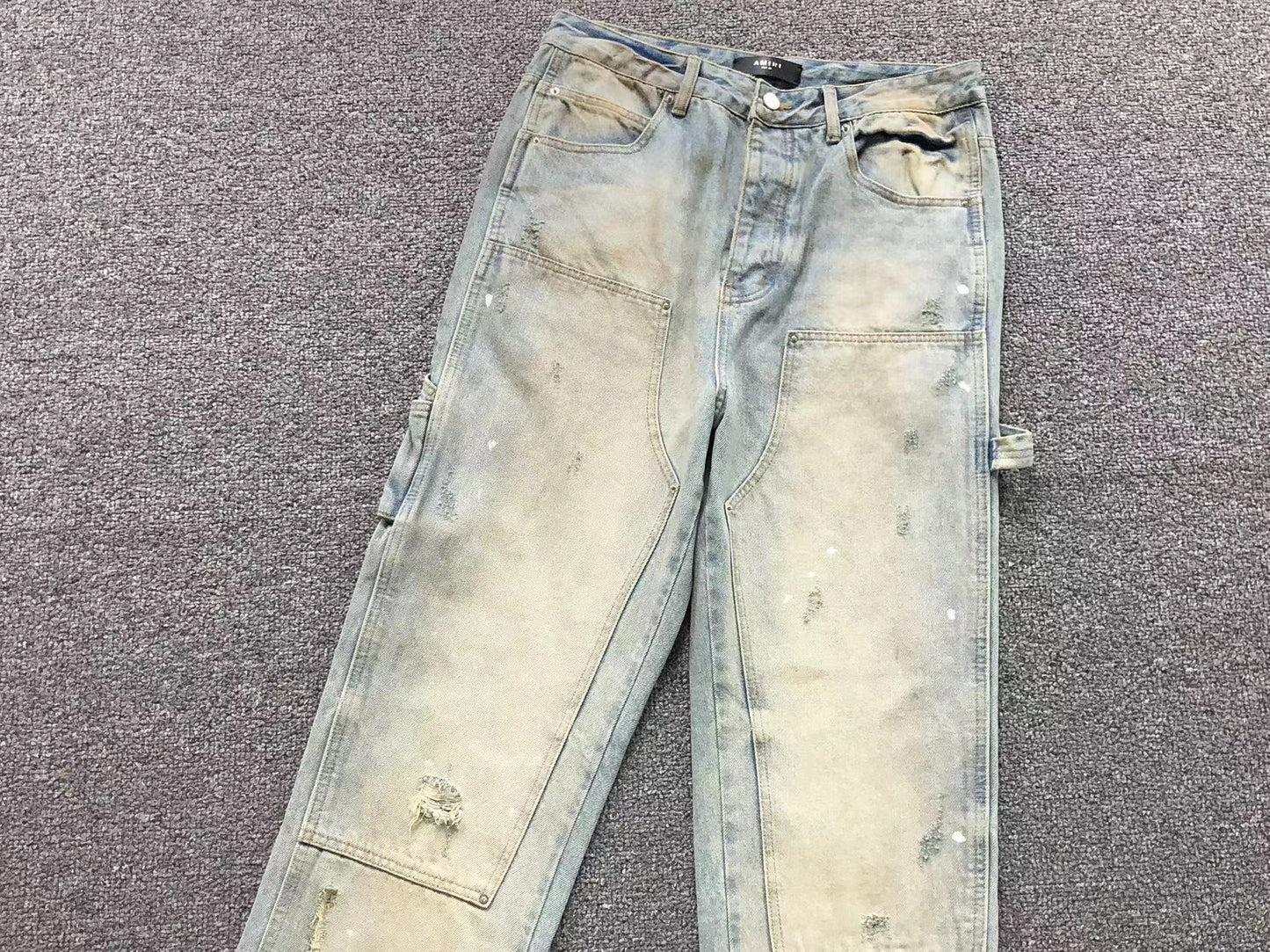 Calça AMIRI Dirty Wash Carpenter Jeans