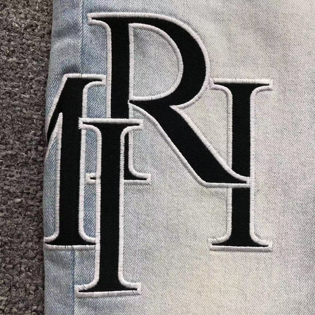 Calça AMIRI TR Monogram Ice Blue Denim