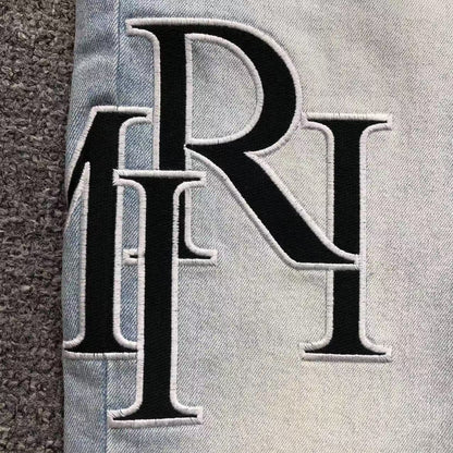 Calça AMIRI TR Monogram Ice Blue Denim