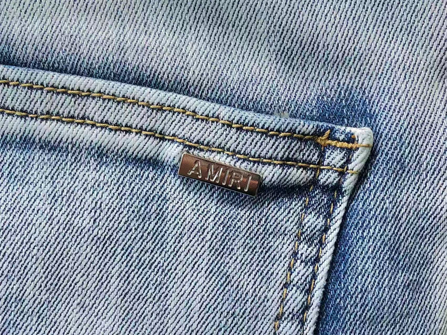 Calça AMIRI Ice Blue Patch Denim