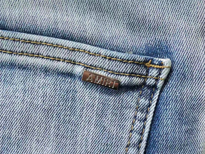 Calça AMIRI Ice Blue Patch Denim