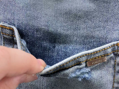 Calça AMIRI Ice Destroyed Paint Denim
