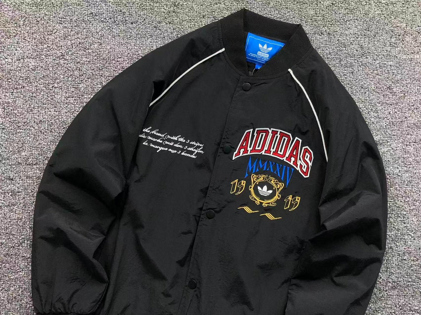 Jaqueta adidas MMXXIV Varsity