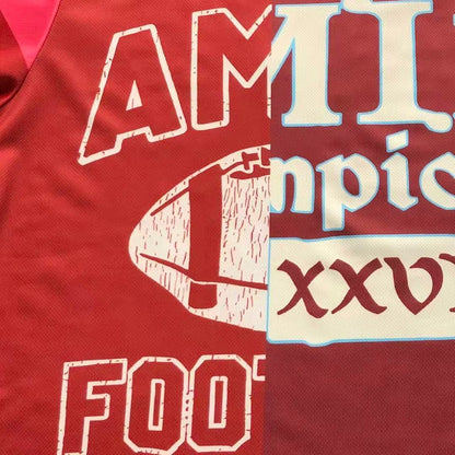 Camiseta AMIRI Champion XXVI Varsit