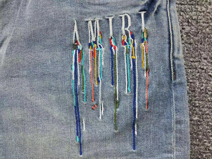 Calça AMIRI Paint Drip Light Wash
