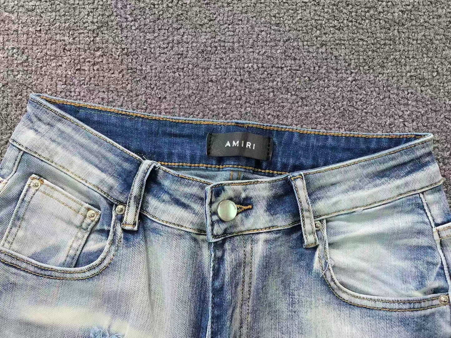 Calça AMIRI Ice Blue Patch Denim
