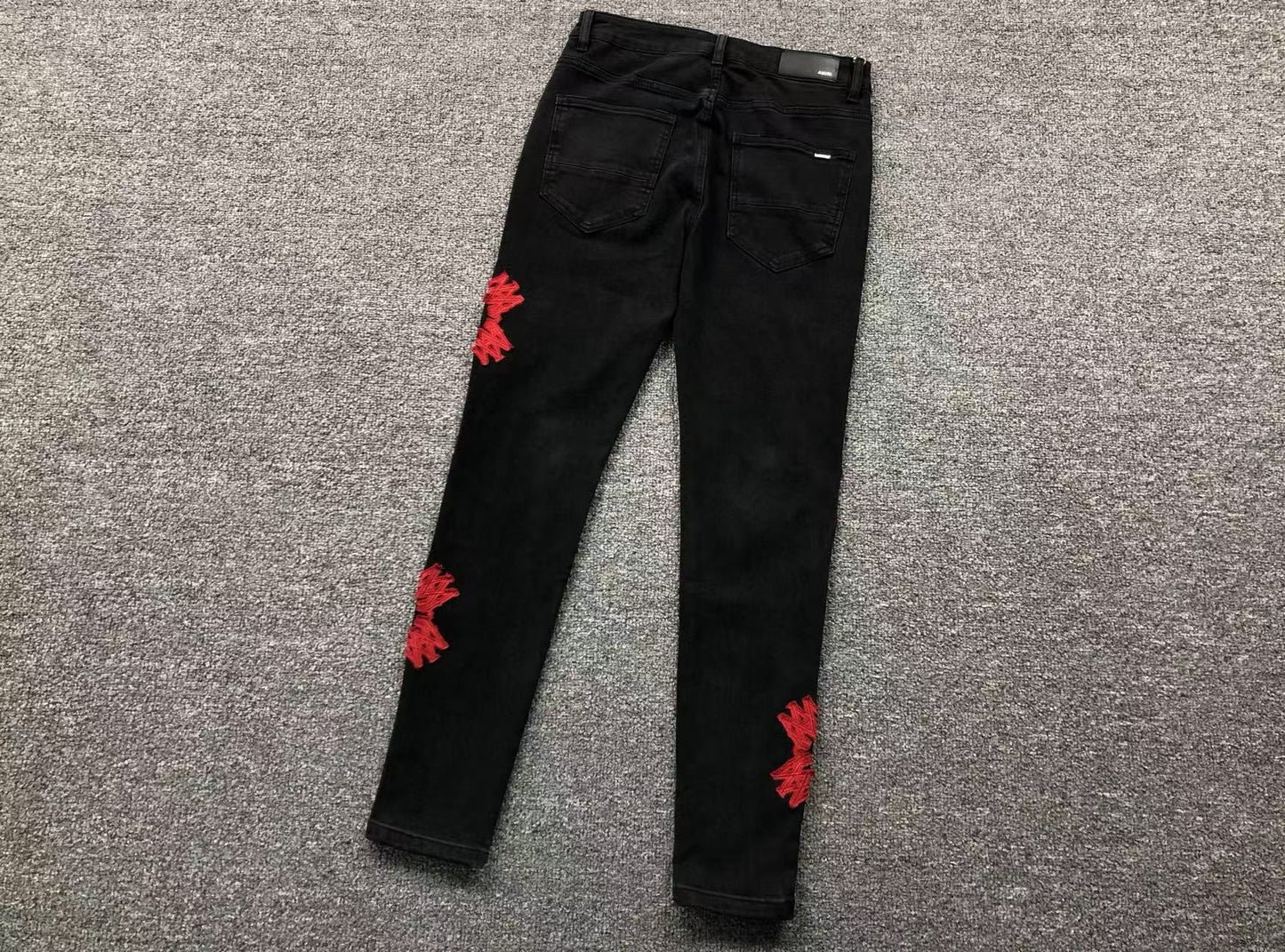Calça AMIRI Bullet Hole Patch Black Denim