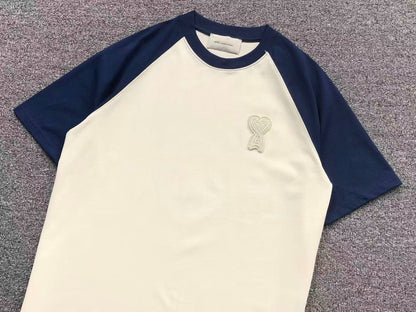 Camiseta AMI Paris Raglan Logo Coração