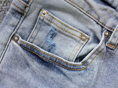 Calça AMIRI Ice Destroyed Paint Denim