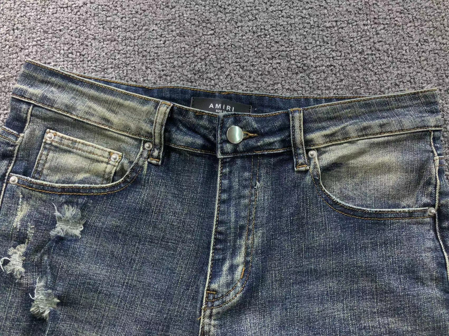 Calça AMIRI Vintage Blue Ribbed Destroyed Denim