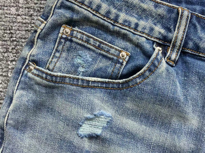 Calça AMIRI Light Wash Destroyed Denim