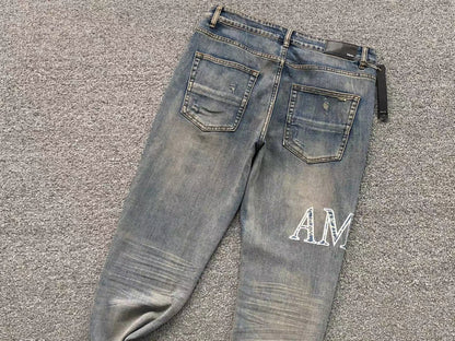 Calça AMIRI Vintage Logo Washed Denim