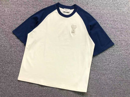 Camiseta AMI Paris Raglan Logo Coração