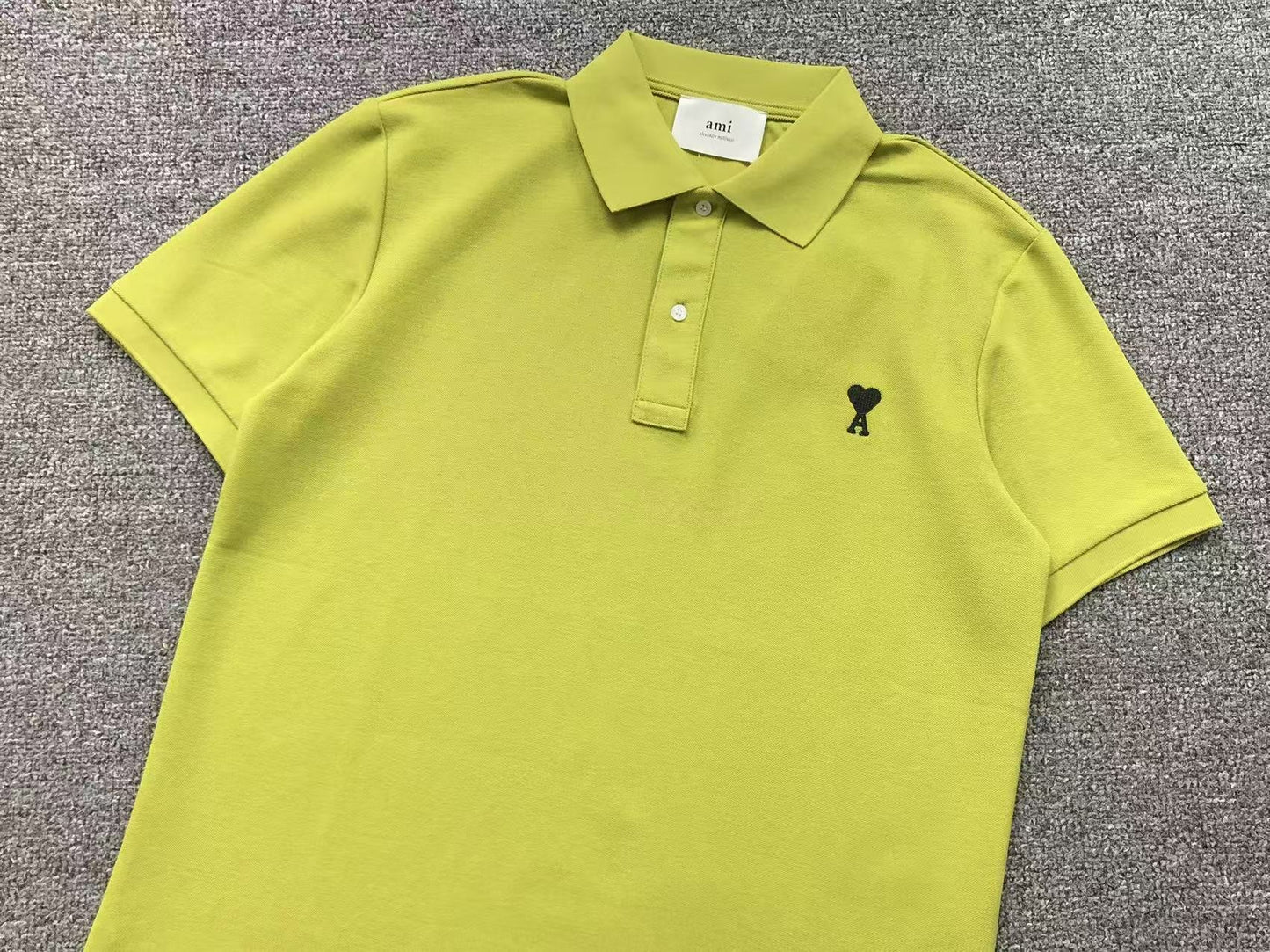 Camiseta Polo AMI Paris Piquet Logo Coração