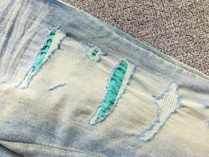 Calça AMIRI TR Ice Blue Distressed Denim