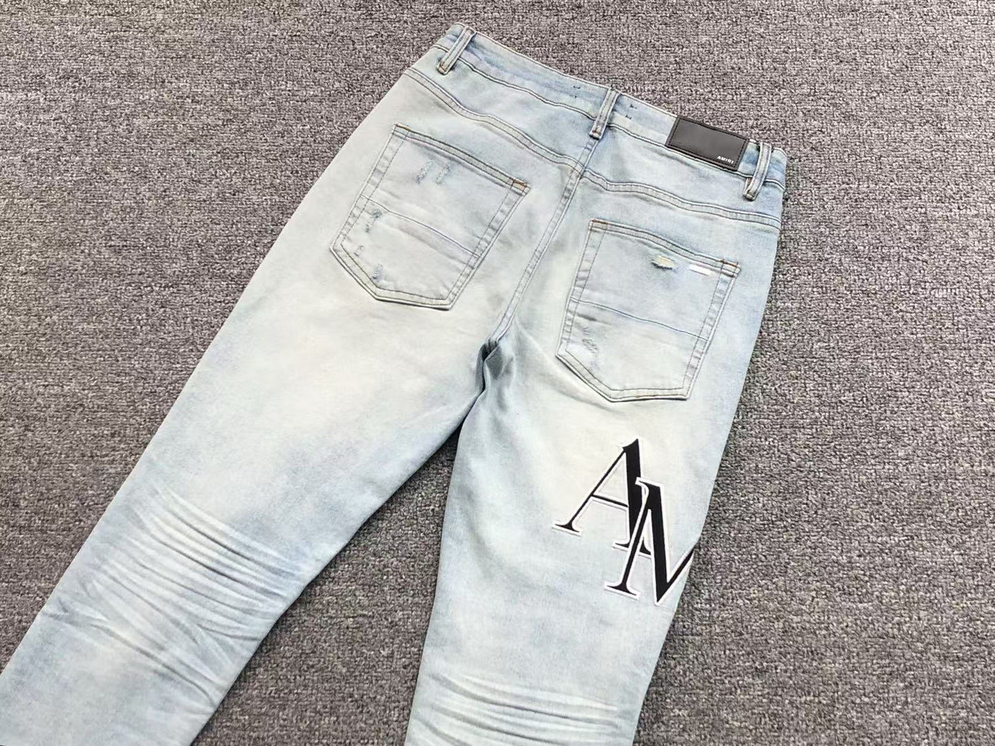 Calça AMIRI TR Monogram Ice Blue Denim