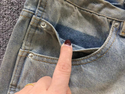 Calça AMIRI Dirty Wash Carpenter Jeans
