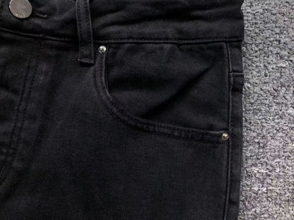 Calça AMIRI Bullet Hole Patch Black Denim