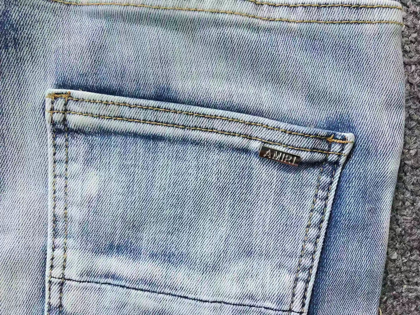 Calça AMIRI Ice Blue Patch Denim