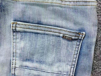 Calça AMIRI Ice Blue Patch Denim