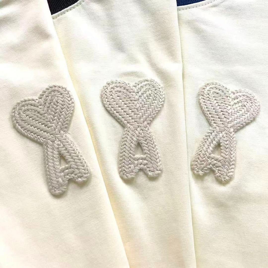 Camiseta AMI Paris Raglan Logo Coração