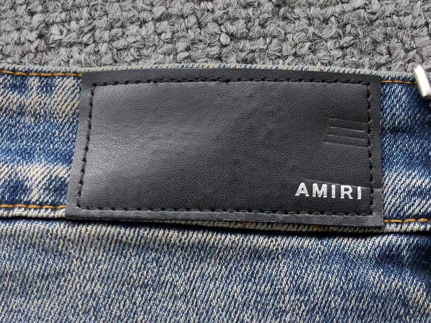 Calça AMIRI Vintage Logo Washed Denim