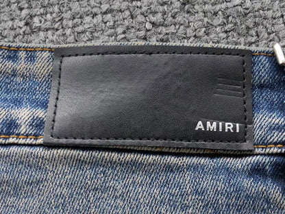 Calça AMIRI Vintage Logo Washed Denim