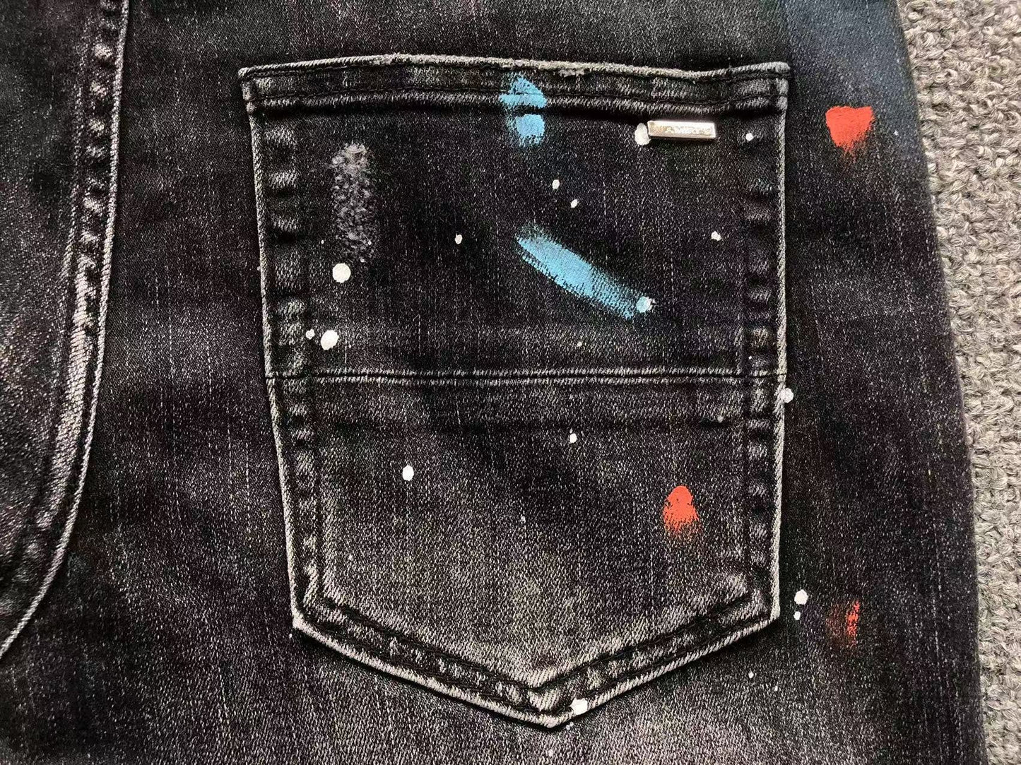 Calça AMIRI Galaxy Paint Black Denim