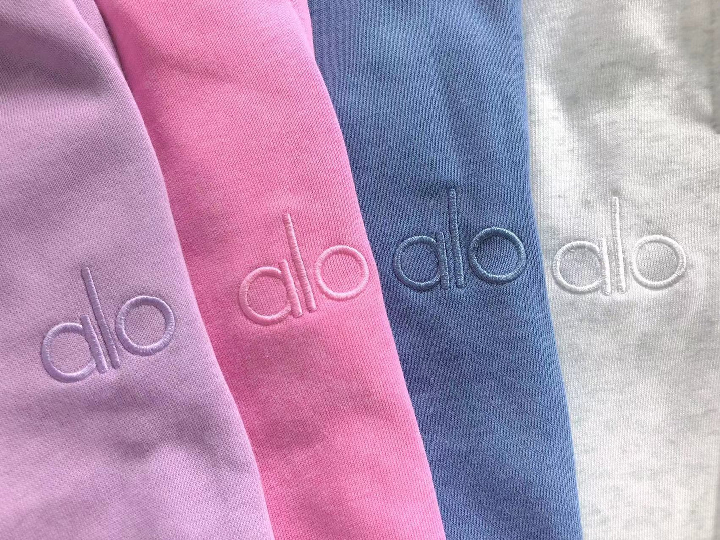 Calça elástica ALO moletom reta feminina
