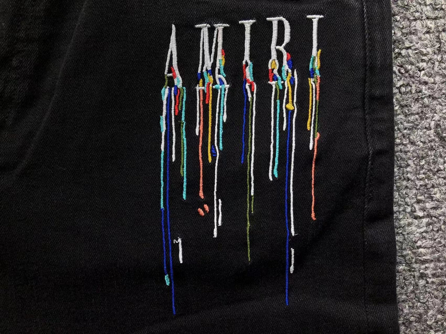 Calça AMIRI Paint Drip Light Wash