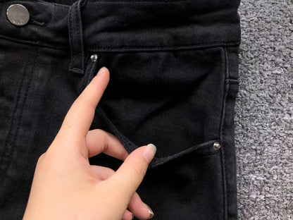 Calça AMIRI Bullet Hole Patch Black Denim