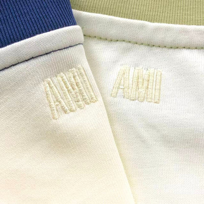 Camiseta AMI Paris Raglan Logo Coração