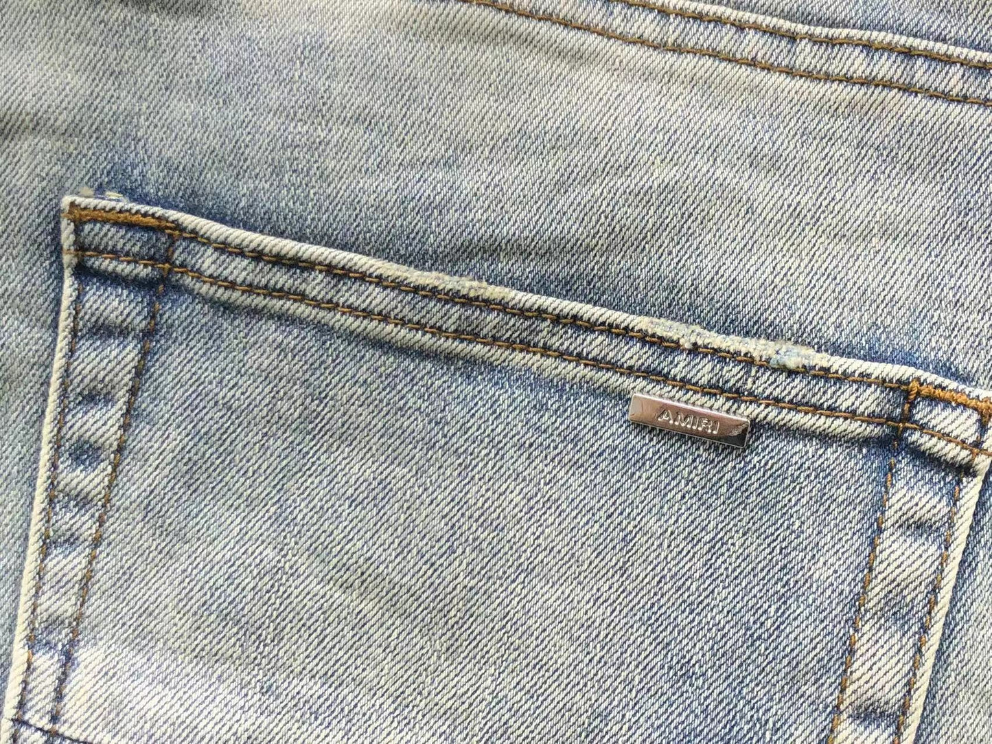 Calça AMIRI Destroyed Ice Wash